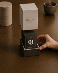 KOVA on the counter beside the morning coffee